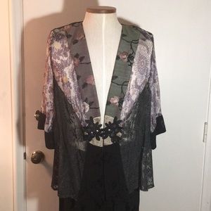Kimono jacket with matching long evening skirt.